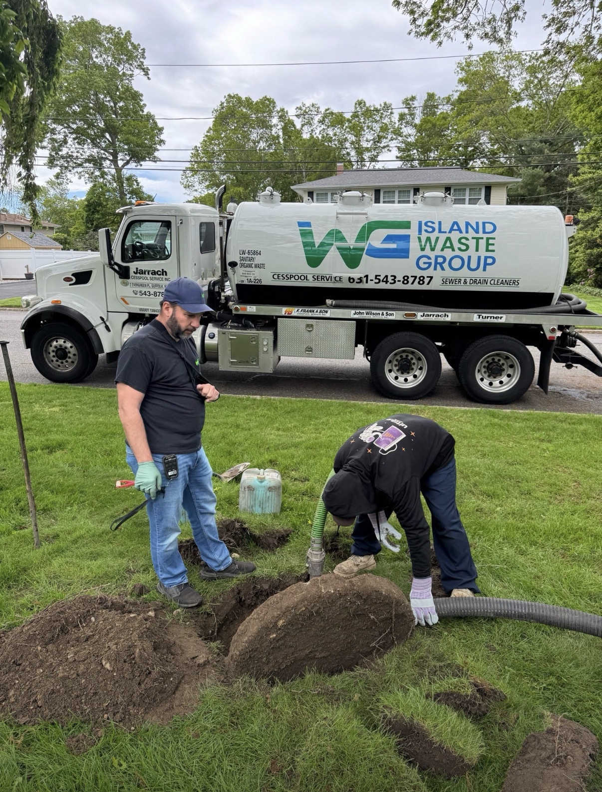 Island Waste Group crew providing residential cesspool service